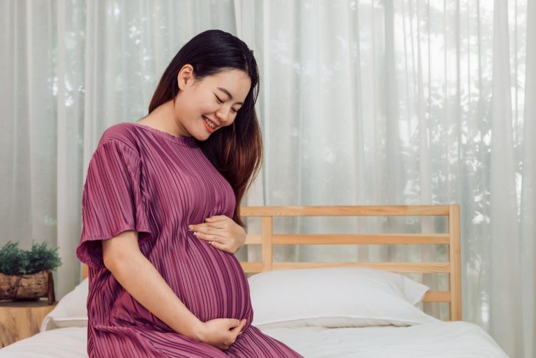 smiling pregnant mother